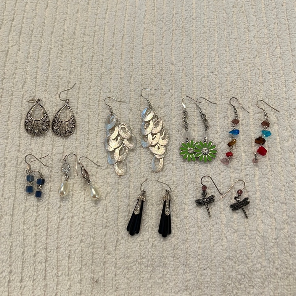 8 pairs of earrings.  Costume jewelry.